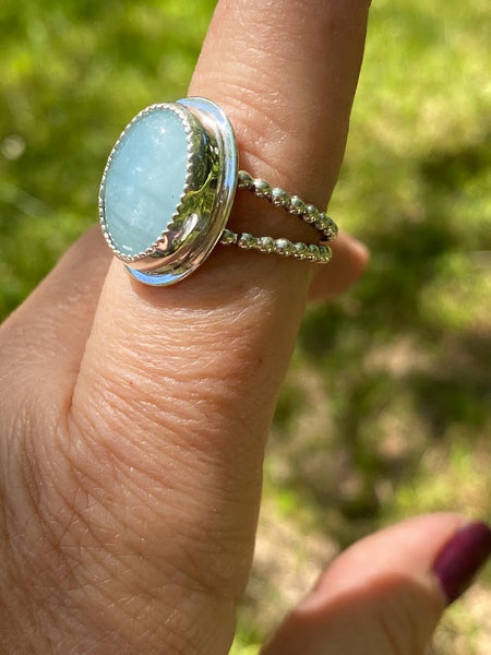 One of a kind handcrafted ring.  This stone though!!!!!! Could not capture the beauty of this stunning Peruvian Blue Opal. This is the kind of stone that you have to see in person, in the light, to appreciate its amazing blue color. Set in a sterling silver band with a light patina applied. Truly amazing!!!   Available in a US size 7.5