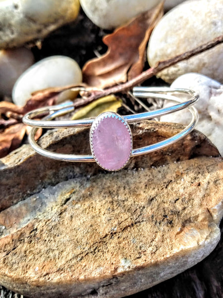 One of a kind handcrafted bracelet.  Beautifully handcrafted sterling silver cuff bracelet, set with a stunning natural Pink Morganite gemstone.  Pictures do not do this stone justice. This eye-catching pink morganite stone absolutely shimmers in the light with a beautiful pink color. Gorgeous!!