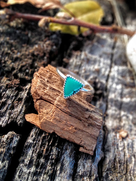 One of a kind handmade ring.  Beautifully handcrafted sterling silver ring set with a  natural, triangle shaped, gorgeous green turquoise stone- size 8   Delicate, smooth, sterling silver round band for an extremely comfortable fit.  Ships within 1 to 2 business days. (Not including weekends or holidays)