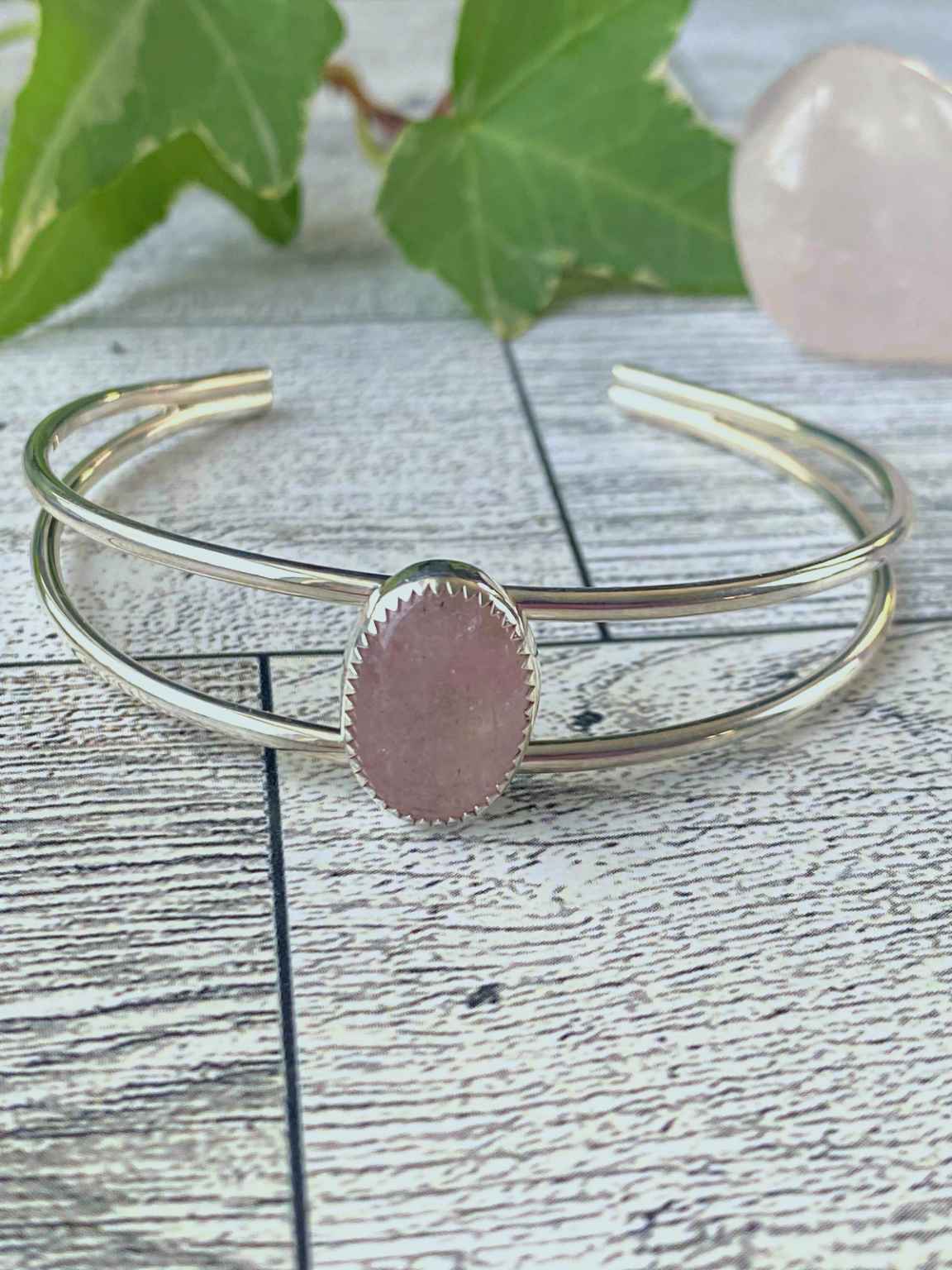 One of a kind handcrafted bracelet.  Beautifully handcrafted sterling silver cuff bracelet, set with a stunning natural Pink Morganite gemstone.  Pictures do not do this stone justice. This eye-catching pink morganite stone absolutely shimmers in the light with a beautiful pink color. Gorgeous!!