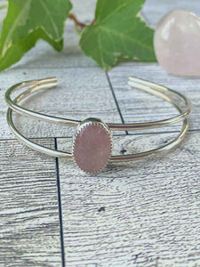 One of a kind handcrafted bracelet.  Beautifully handcrafted sterling silver cuff bracelet, set with a stunning natural Pink Morganite gemstone.  Pictures do not do this stone justice. This eye-catching pink morganite stone absolutely shimmers in the light with a beautiful pink color. Gorgeous!!