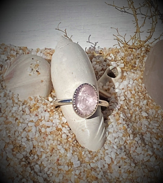 One of a kind handcrafted ring.  Oh how I love me some PINK!!! So dainty and feminine, you cannot go wrong with this beauty if you are purchasing as a gift for a loved one or for yourself. Pink Morganite is semi translucent with an amazing pink hue that goes so well with bright shiny silver.  Available in a US size 7.  Pink Morganite brings the energy rays of determination, commitment, and caring. Pink is the color of new love, new romance and new relationships. Love is in the air!!!